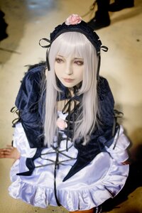 Rating: Safe Score: 0 Tags: 1girl auto_tagged bangs blurry depth_of_field dress flower frills gothic_lolita hairband lips lolita_fashion long_hair long_sleeves looking_at_viewer red_eyes rose silver_hair solo suigintou User: admin