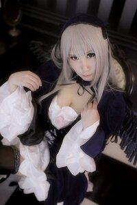 Rating: Safe Score: 0 Tags: 1girl 3d black_legwear breasts choker cleavage dress lace lips looking_at_viewer sitting solo suigintou thighhighs User: admin