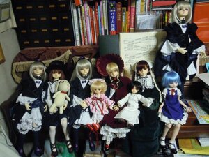 Rating: Safe Score: 0 Tags: 6+girls blonde_hair bow doll dress hat multiple_dolls multiple_girls sitting tagme wings User: admin