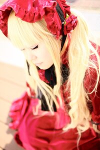 Rating: Safe Score: 0 Tags: 1girl bangs blonde_hair blurry blurry_background blurry_foreground closed_eyes depth_of_field dress flower long_hair photo red_flower red_rose rose shinku solo User: admin