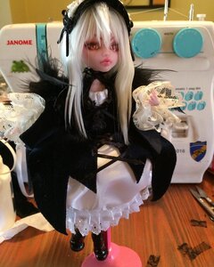 Rating: Safe Score: 0 Tags: 1girl doll lips long_hair photo red_eyes solo suigintou wings User: admin