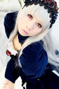 Rating: Safe Score: 0 Tags: 1girl bangs blonde_hair blurry blurry_background blurry_foreground closed_mouth depth_of_field dress flower lace lips lolita_fashion long_hair looking_at_viewer red_eyes red_flower red_rose rose solo suigintou User: admin