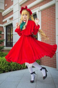 Rating: Safe Score: 0 Tags: 1girl bangs black_footwear blonde_hair bonnet bow capelet dress full_body high_heels long_hair long_sleeves pantyhose photo red_dress shinku shoes solo standing white_legwear User: admin