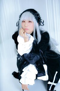 Rating: Safe Score: 0 Tags: 1girl bangs black_dress blue_background closed_mouth dress frills full_body gothic_lolita hairband high_heels lips lolita_fashion long_hair long_sleeves looking_at_viewer red_eyes ribbon sitting solo suigintou User: admin