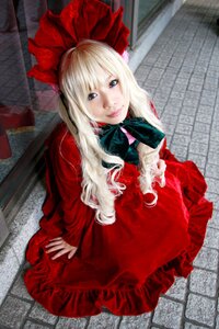 Rating: Safe Score: 0 Tags: 1girl blonde_hair blue_eyes bow capelet dress frills indoors long_hair long_sleeves looking_at_viewer photo red_capelet red_dress ribbon shinku sitting solo tile_floor tiles User: admin