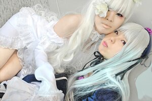 Rating: Safe Score: 0 Tags: 2girls bangs dress frills gothic_lolita hairband lace lips lolita_fashion long_hair multiple_cosplay multiple_girls photo realistic red_eyes ribbon suigintou tagme white_hair User: admin