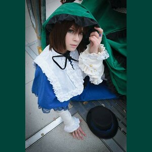 Rating: Safe Score: 0 Tags: 1girl bangs brown_hair capelet dress frills hat lips long_sleeves looking_at_viewer nail_polish one_eye_closed ribbon short_hair sitting solo souseiseki User: admin