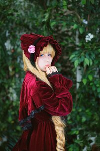 Rating: Safe Score: 0 Tags: 1girl bangs blonde_hair blue_eyes blurry blurry_background bonnet depth_of_field dress flower long_hair long_sleeves looking_at_viewer outdoors red_dress shinku solo standing User: admin