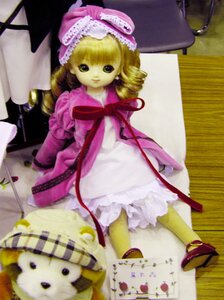 Rating: Safe Score: 0 Tags: 1girl blonde_hair bow doll dress drill_hair frills hina_ichigo hinaichigo long_sleeves looking_at_viewer photo pink_bow ribbon sitting solo standing User: admin