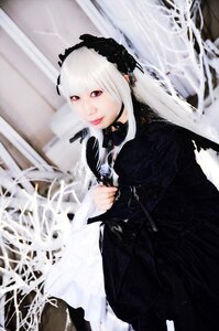 Rating: Safe Score: 0 Tags: 1girl black_dress blurry blurry_background depth_of_field dress gothic_lolita holding lips lolita_fashion long_hair long_sleeves looking_at_viewer solo suigintou white_hair User: admin