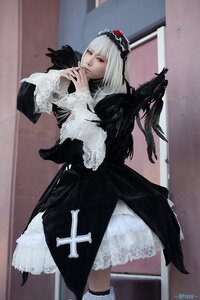 Rating: Safe Score: 0 Tags: 1girl bangs black_dress black_wings boots closed_mouth dress feathers frills gothic_lolita indoors lolita_fashion long_hair long_sleeves photo signature solo standing suigintou white_hair User: admin