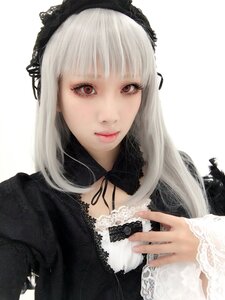 Rating: Safe Score: 0 Tags: 1girl bangs closed_mouth dress gothic_lolita hairband lace lace_trim lips lolita_fashion long_hair long_sleeves looking_at_viewer red_eyes ribbon silver_hair smile solo suigintou upper_body white_background User: admin