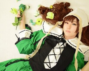 Rating: Safe Score: 0 Tags: 1girl brown_hair dress flower green_dress lace lips long_hair long_sleeves ribbon solo suiseiseki User: admin