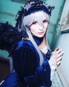 Rating: Safe Score: 0 Tags: 1girl black_dress blurry blurry_background closed_mouth depth_of_field dress frills gothic_lolita hairband lips lolita_fashion lolita_hairband long_hair long_sleeves looking_at_viewer outdoors photo red_eyes solo suigintou upper_body User: admin