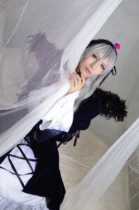 Rating: Safe Score: 0 Tags: 1girl dress flower frills gothic_lolita hairband lips lolita_fashion long_hair long_sleeves looking_at_viewer red_eyes silver_hair solo suigintou User: admin