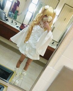 Rating: Safe Score: 0 Tags: 1girl blonde_hair dress flower hair_ornament holding indoors kirakishou long_hair solo standing white_dress User: admin