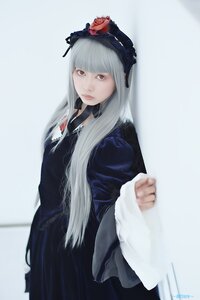 Rating: Safe Score: 0 Tags: 1girl bangs blunt_bangs blurry depth_of_field dress lips long_hair long_sleeves looking_at_viewer red_eyes solo suigintou User: admin