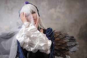 Rating: Safe Score: 0 Tags: 1girl bangs breasts closed_mouth dress frills hairband long_hair long_sleeves rain solo suigintou upper_body white_hair wings User: admin