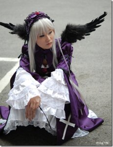 Rating: Safe Score: 0 Tags: 1girl black_wings doll dress feathered_wings feathers flower frills hairband lips long_hair long_sleeves looking_at_viewer silver_hair solo suigintou wings User: admin