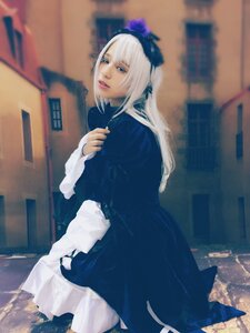 Rating: Safe Score: 0 Tags: 1girl blue_eyes blurry blurry_background depth_of_field dress flower indoors lips long_hair long_sleeves looking_at_viewer photo solo suigintou white_hair User: admin