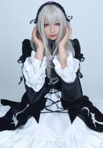 Rating: Safe Score: 0 Tags: 1girl black_ribbon closed_mouth frilled_sleeves frills gothic_lolita hairband lips lolita_fashion long_hair long_sleeves looking_at_viewer red_eyes ribbon silver_hair solo suigintou User: admin