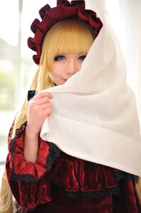 Rating: Safe Score: 0 Tags: 1girl bangs blonde_hair blue_eyes blunt_bangs bonnet curtains dress frills long_hair long_sleeves looking_at_viewer red_dress shinku sitting smile solo User: admin