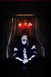 Rating: Safe Score: 0 Tags: 1girl auto_tagged black_dress dress flower frills gothic_lolita lolita_fashion long_sleeves sitting solo suigintou User: admin