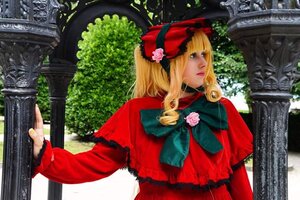 Rating: Safe Score: 0 Tags: 1girl blonde_hair bonnet brooch building capelet day dress flower gate hat lips long_sleeves outdoors photo red_dress rose shinku solo tree upper_body User: admin