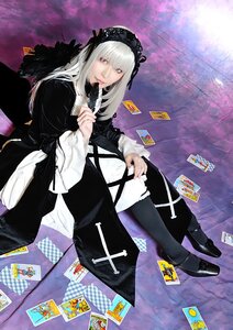 Rating: Safe Score: 0 Tags: 1girl black_footwear card long_hair long_sleeves looking_at_viewer playing_card silver_hair solo suigintou User: admin