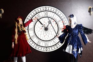 Rating: Safe Score: 0 Tags: 2girls blonde_hair clock cross dress hat long_hair magic_circle multiple_cosplay multiple_girls outstretched_arm red_dress shinku suigintou tagme very_long_hair wings User: admin