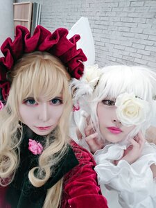 Rating: Safe Score: 0 Tags: 2girls bangs blonde_hair blue_eyes bonnet flower hair_ornament hat lips lolita_fashion long_hair looking_at_viewer multiple_cosplay multiple_girls pink_rose realistic rose shinku tagme white_flower white_rose User: admin