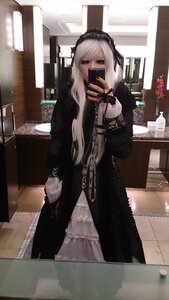 Rating: Safe Score: 0 Tags: 1girl bangs black_eyes covered_mouth covering_mouth dress holding holding_phone long_hair long_sleeves looking_at_viewer phone solo standing suigintou white_hair User: admin