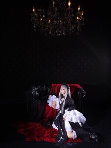 Rating: Safe Score: 0 Tags: 1girl black_background dress long_hair sitting solo suigintou User: admin