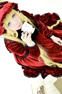 Rating: Safe Score: 0 Tags: 1girl bangs blonde_hair blue_eyes bonnet cup dress eyelashes frills hat holding holding_cup lace lolita_fashion long_hair long_sleeves looking_at_viewer red_dress shinku sitting solo teacup very_long_hair User: admin