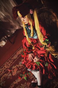 Rating: Safe Score: 0 Tags: 1girl blonde_hair blue_eyes dress flower frills hat long_hair profile red_dress shinku solo very_long_hair User: admin