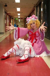 Rating: Safe Score: 0 Tags: 1girl blonde_hair dress frills hat high_heels hinaichigo leg_ribbon long_sleeves red_footwear ribbon shoes short_hair sitting solo User: admin