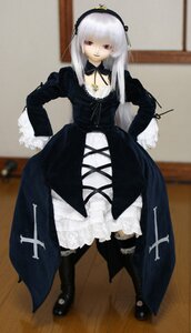 Rating: Safe Score: 0 Tags: 1girl black_dress black_legwear blurry depth_of_field doll dress frills full_body fur_trim gothic_lolita hairband hand_on_hip indoors lolita_fashion long_hair long_sleeves looking_at_viewer photo red_eyes ribbon silver_hair solo standing suigintou white_hair User: admin