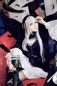 Rating: Safe Score: 0 Tags: 1girl bird black_feathers black_wings boots crow dress feathered_wings feathers hairband lips long_hair long_sleeves red_eyes sitting solo suigintou white_hair wings User: admin