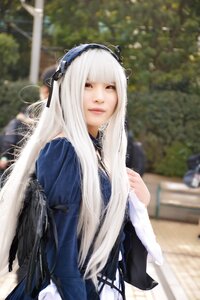 Rating: Safe Score: 0 Tags: 1girl 3d bangs blurry blurry_background blurry_foreground closed_mouth depth_of_field dress hairband long_hair outdoors photo red_eyes solo suigintou User: admin