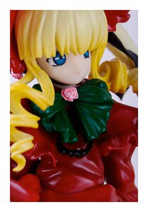 Rating: Safe Score: 0 Tags: 1girl bangs blonde_hair blue_eyes bow bowtie doll dress drill_hair flower long_hair long_sleeves looking_at_viewer photo pink_rose red_dress rose shinku solo User: admin