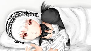 Rating: Safe Score: 3 Tags: 1girl auto_tagged bangs black_ribbon collarbone dress eyebrows_visible_through_hair frills hairband image long_hair long_sleeves looking_at_viewer lying open_mouth puffy_sleeves ribbon silver_hair solo suigintou User: admin