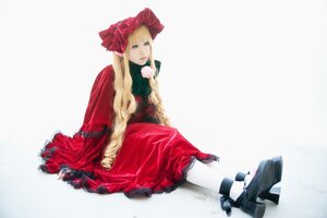 Rating: Safe Score: 0 Tags: 1girl blonde_hair blue_eyes bonnet bow dress full_body long_hair long_sleeves looking_at_viewer pantyhose red_dress shinku sitting solo User: admin