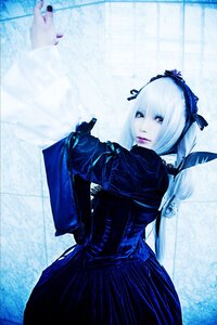 Rating: Safe Score: 0 Tags: 1girl blue_background blue_theme dress hairband long_sleeves looking_at_viewer looking_back pale_skin short_hair solo suigintou User: admin