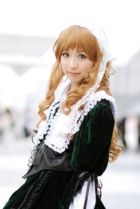 Rating: Safe Score: 0 Tags: 1girl apron bangs black_dress blonde_hair blurry blurry_background cowboy_shot depth_of_field dress frills lace lips long_hair long_sleeves looking_at_viewer maid photo smile solo suiseiseki User: admin