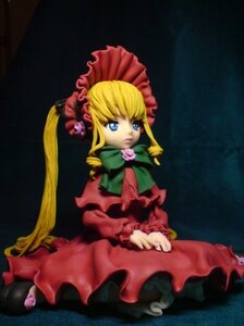 Rating: Safe Score: 0 Tags: 1girl blonde_hair blue_eyes bonnet bow bowtie doll dress flower long_hair long_sleeves looking_at_viewer red_dress rose shinku sitting solo twintails very_long_hair User: admin