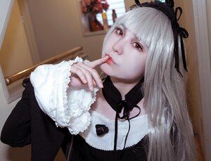 Rating: Safe Score: 0 Tags: 1girl bangs blunt_bangs blurry blurry_background depth_of_field frills gothic_lolita indoors lips lolita_fashion long_hair looking_at_viewer nail_polish photo red_eyes red_lips ribbon solo suigintou upper_body white_hair User: admin