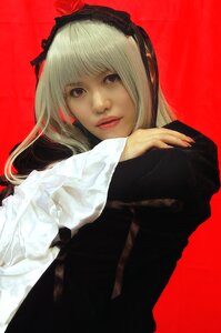 Rating: Safe Score: 0 Tags: 1girl bangs black_dress dress eyelashes hairband lips long_hair long_sleeves looking_at_viewer red_background red_lips see-through solo suigintou upper_body User: admin