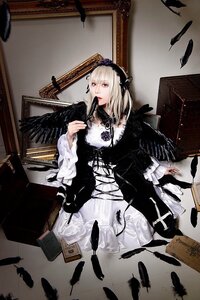 Rating: Safe Score: 0 Tags: 1girl bird black_dress black_feathers dress feathers frills gothic_lolita long_sleeves painting_(object) rose sitting solo suigintou wide_sleeves wings User: admin