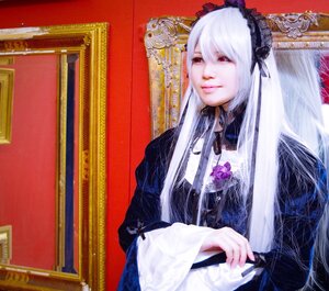 Rating: Safe Score: 0 Tags: 1girl bangs closed_mouth dress hairband holding long_hair long_sleeves looking_at_viewer red_eyes solo suigintou User: admin