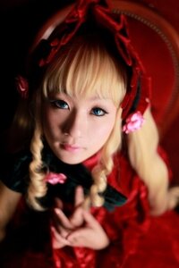 Rating: Safe Score: 0 Tags: 1girl blonde_hair blue_eyes blurry blurry_foreground depth_of_field dress lips long_hair looking_at_viewer red_dress shinku solo User: admin